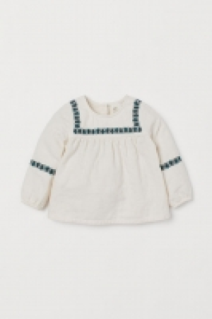  Embroidered cotton blouse 13.00 €
