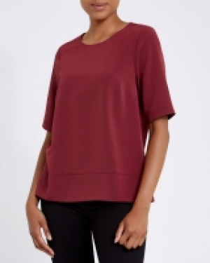 Woven Front Top 5.00 €