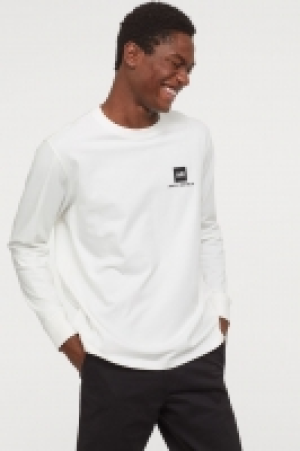  Long-sleeved cotton top 9.99 €