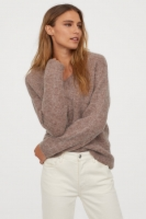  Knitted wool-blend jumper 25.00 €