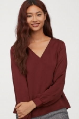  V-neck blouse 25.00 €