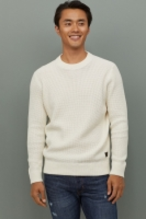  Textured-knit cotton jumper 17.99 €
