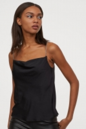  Satin top with sparkly stones 8.00 €