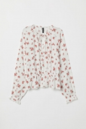  Blouse with buttons 18.00 €