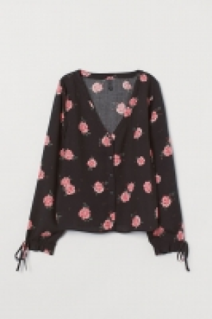  Blouse with buttons 8.00 €