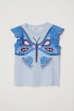  Flounce-sleeved top 4.00 €
