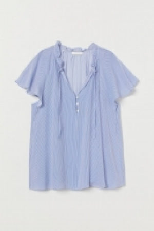  Blouse with butterfly sleeves 10.00 €