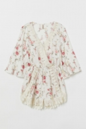  Playsuit with lace 18.00 €