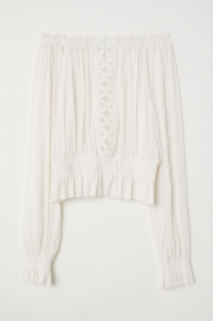  Crinkled blouse 13.00 €