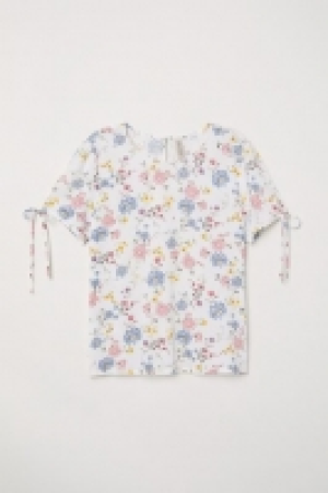  Short-sleeved blouse 6.00 €