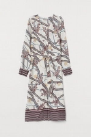  Dress with a belt 18.00 €