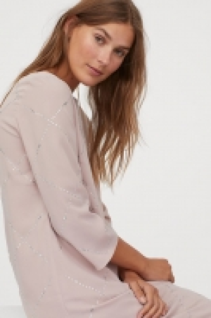  Dress with sparkly stones 25.00 €