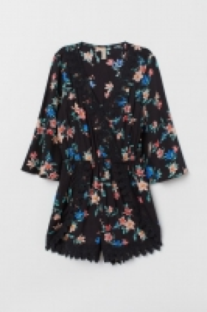 Playsuit with lace 15.00 €