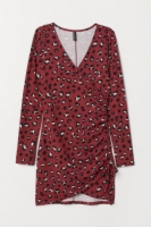 Jersey dress with a drawstring 18.00 €