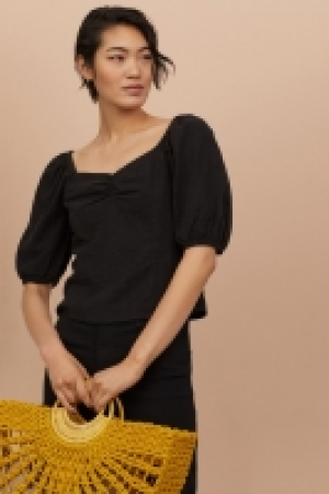 Linen-blend top 9.99 €