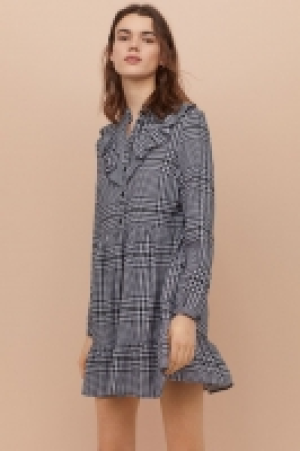 Flounce-trimmed dress 12.99 €