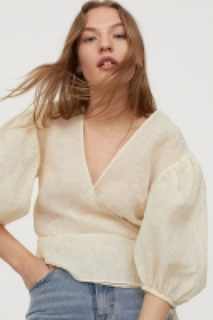 Crinkled wrapover blouse 17.99 €