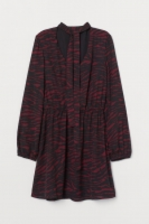 Dress with ties 5.99 €