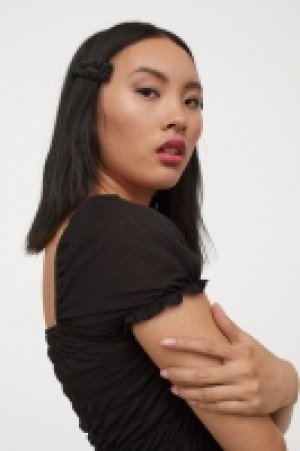 Smocked top 6.99 €
