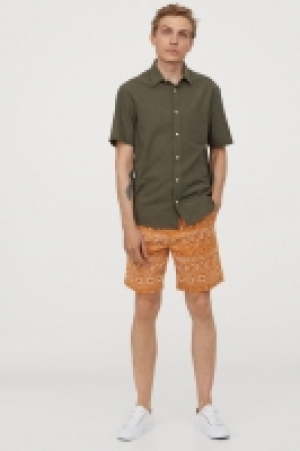 Knee-length cotton shorts 12.99 €