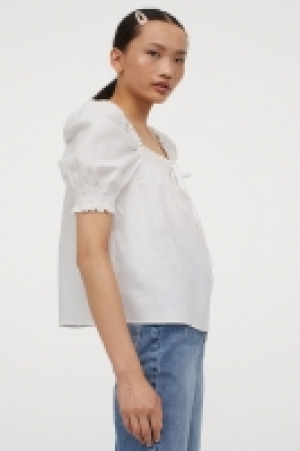 Puff-sleeved cotton blouse 10.00 €