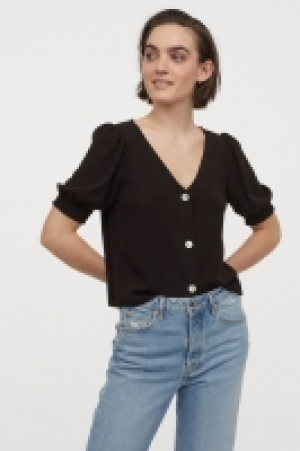Puff-sleeved blouse 7.00 €