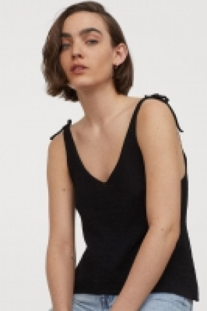 Knitted strappy top 7.00 €