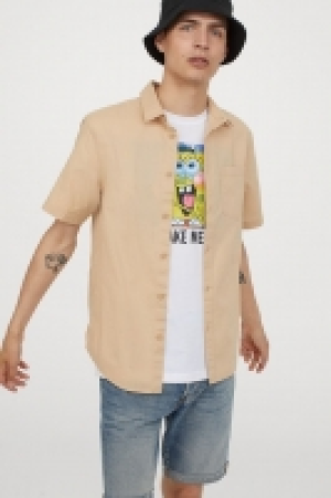 Short-sleeved cotton shirt 6.00 €