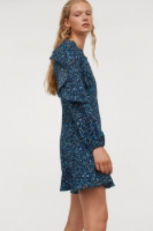 Flounce-trimmed dress 13.00 €
