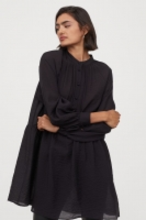 Long-sleeved dress 9.00 €
