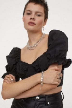 Puff-sleeved cropped top 10.00 €