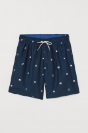 HM  Knee-length swim shorts