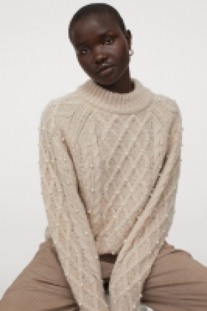 Beaded cable-knit jumper 23.00 €