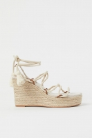 Wedge-heeled sandals 26.00 €