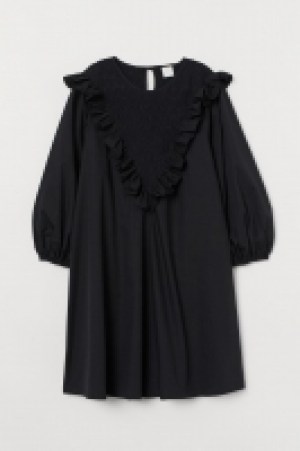 Flounce-trimmed cotton dress 13.00 €