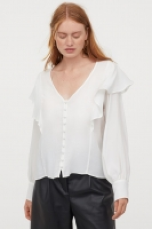 Flounce-trimmed blouse 9.00 €