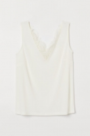 Sleeveless lace-detail top 6.00 €