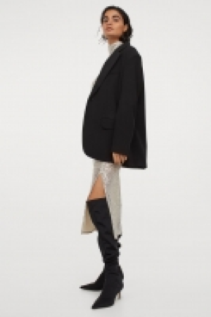 Slit-front sequined skirt 21.00 €