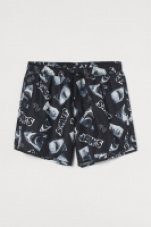 HM  Patterned swim shorts