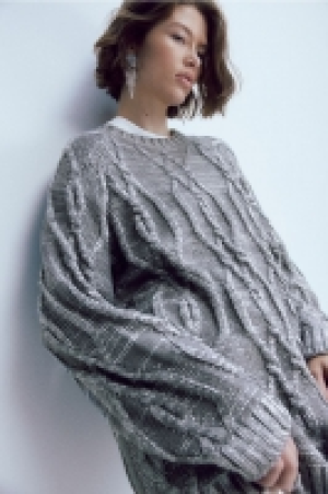 Oversized shimmering metallic jumper