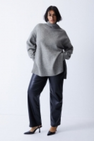 Oversized polo-neck jumper 25.00 €