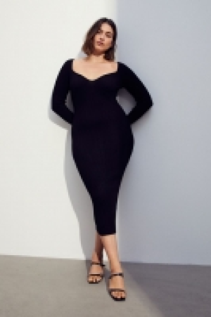 Rib-knit dress 31.00 €