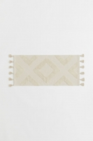 Tasselled bath mat 21.00 €