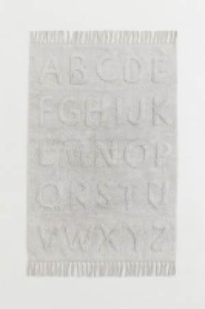 Tufted patterned cotton rug