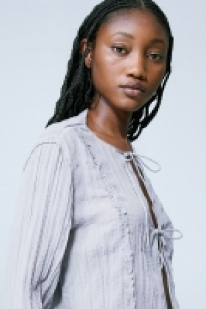Sheer tie-front top