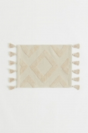 Tasselled bath mat