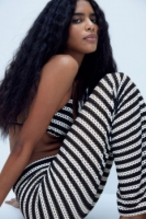 Hole-patterned beach trousers