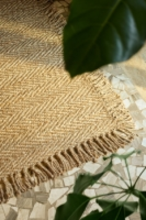 Fringed jute rug